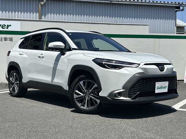 トヨタ カローラ クロス ハイブリッド Z 東京都 2025(令7)年 0.1万km プラチナホワイトパールマイカ ワンオーナー/メモリナビ/全方カメラ/フルセグテレビ/Toyota Safety Sense/バックガイドモニター/ルーフレール/純正18インチAW/パワーバックドア/ETC2.0/保証書/取説書