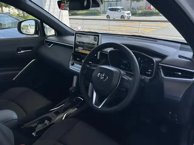 トヨタ カローラ クロス ハイブリッド Z 東京都 2025(令7)年 0.1万km プラチナホワイトパールマイカ ワンオーナー/メモリナビ/全方カメラ/フルセグテレビ/Toyota Safety Sense/バックガイドモニター/ルーフレール/純正18インチAW/パワーバックドア/ETC2.0/保証書/取説書