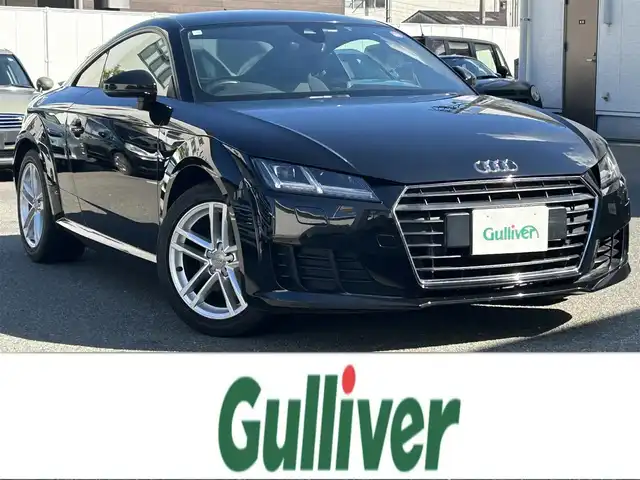 アウディ ＴＴクーペ 2．0 TFSI 福岡県 2016(平28)年 8.4万km ミトスブラックメタリック アシスタンスパッケージ/　・クルーズコントロール/　・ホールドアシスト/　・パーキングシステム（フロント・リア）/　・リアビューカメラ/マトリクスヘットライト/シーケンシェルウインカー/バーチャルコックピット/純正メーカーナビ（BT・AM・FM・CD）/電動リアスポイラー/アウディパーキングシステム/ドライブセレクト（エフィシャンシ・コンフォート・オート・ダイナミック・カスタム）/パドルシフト/アイドリングストップ/ウインカーミラー/USB入力端子/純正フロアマット/純正アルミホイール/LEDヘッドライト/オートライト/スマートキー/オートエアコン/プッシュスタートボタン/横滑り防止装置/盗難防止装置/カーテンエアバック