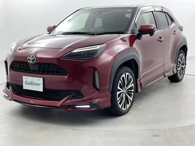 トヨタ ヤリスクロス ハイブリッド Z 福井県 2021(令3)年 6.1万km センシュアルレッドマイカ 純正８インチナビ/Bluetooth/USB/Miracast/AM/FM/モデリスタエアロ/バックカメラ/Toyota Safety Sense/・プリクラッシュセーフティ/・レーンアシスト/・クルーズコントロール/・オートマチックハイビーム/・オートライト/パワーバックドア/ブラインドスポットモニター/クリアランスソナー/LEDヘッドライト/ライトレベライザー/ビルトインETC/ブラインドスポットモニター/パワーシート/シートヒーター/純正１８インチアルミ/純正フロアマッ十