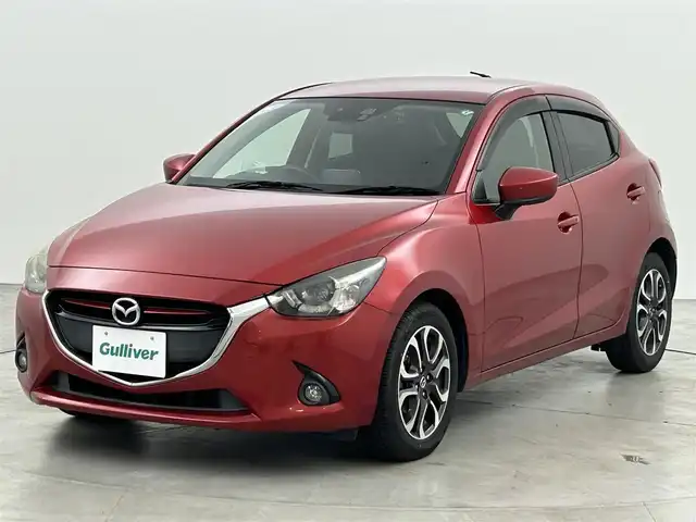 マツダ デミオ XD ツーリング 福岡県 2015(平27)年 7.3万km ソウルレッドプレミアムメタリック 純正ナビ（ＢＴ，フルセグＴＶ）　/バックカメラ　/ＥＴＣ　/３６０°ドライブレコーダー　/クルーズコントロール　/衝突軽減ブレーキ　/踏み間違い防止　/アイドリングストップ　/パドルシフト　/純正１６インチＡＷ　/ＬＥＤ