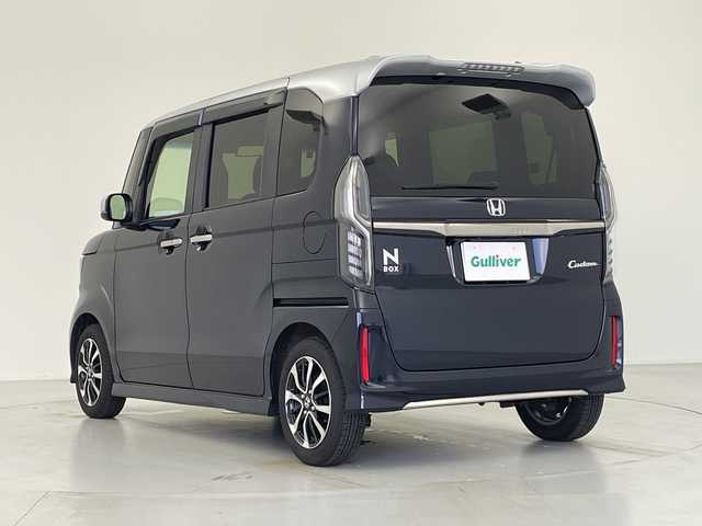 ホンダ Ｎ ＢＯＸ カスタム L コーディネートスタイル 愛知県 2023(令5)年 0.9万km ミッドナイトブルービームM オプションメモリナビ/（DTV/Bluetooth）/衝突軽減/レーンキープアシスト/先行車発進検知/コーナーセンサー/追従機能付きクルーズコントロール/バックカメラ/ETC/両側パワースライドドア/レザーシート/シートヒーター/シーケンシャルウィンカー/LEDヘッドライト/フォグランプ/ウィンカーミラー/電格ミラー/ドアバイザー