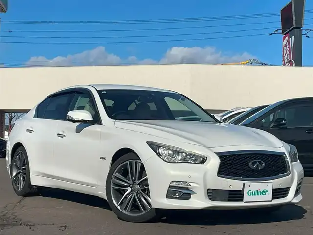 日産 スカイライン ハイブリッド 350GT Type P 秋田県 2014(平26)年 9.5万km クリスタルホワイトパール 4WD/純正ナビ/（CD/DVD/BT/ラジオ）/フルセグTV/全方位カメラ/BOSEスピーカー/プッシュスタート/ステアリングスイッチ/アクティブクルーズコントロール/前席パワーシート/前席シートヒーター/運転席メモリー機能付きシート/前後コーナーセンサー/ビルトインETC/純正フロアマット/ビークルダイナミクスコントロール/車両接近通報装置/ドアバイザー/ドライブモード/Fドライブレコーダー