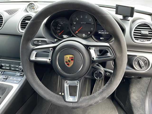 ポルシェ ポルシェ ７１８ボクスター GTS 4．0 埼玉県 2020(令2)年 4.9万km シルバー 登録時48334ｋｍ/マニュアル車/ワンオーナー/純正ナビ（AM/FM/BT）/バックカメラ/スポーツエキゾーストシステム/アクティブサスペンションマネジメントシステム/コーナーセンサー/純正２０インチAW/前席シートヒーター/LEDヘッドライト/クルーズコントロール/ドライブレコーダー(WHSR-510)/ビルトインETC2.0/キーレス×２/横滑り防止/電動格納ミラー/純正フロアマット/保証書/取扱説明書