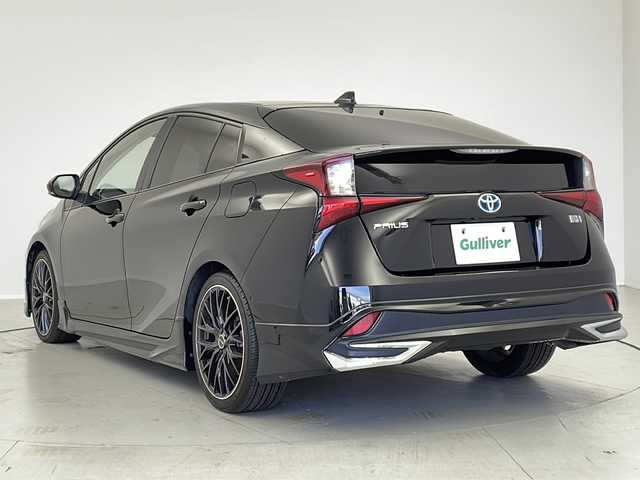 トヨタ プリウス A ツーリングセレクション 茨城県 2020(令2)年 5.8万km アティチュードブラックマイカ モデリスタエアロ/9型純正ナビ/　CD/DVD/Bluetooth/AM/FM/フルセグＴＶ/パノラミックビューモニター/ビルトインＥＴＣ/トヨタセーフティーセンス/・プリクラッシュセーフティ/・レーダークルーズコントロール/・レーントレーシングアラート/・オートマチックハイビーム/・パーキングサポートブレーキ/・ロードサインアシスト/ブラインドスポットモニター/社外前後ドライブレコーダー/レーダー探知機/社外18インチAW/純正フロアマット/パワーシート/合皮シート/シートヒーター/革巻ステアリング/ヘッドアップディスプレイ/ステアリングリモコン/オートライト/ＬＥＤライト/ＬＥＤフォグランプ/AC100V/オートリトラクタブルミラー/スマートキー/プッシュスタート/積み込み純正AWサマータイヤ