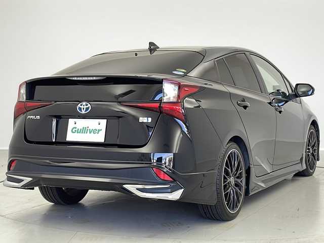 トヨタ プリウス A ツーリングセレクション 茨城県 2020(令2)年 5.8万km アティチュードブラックマイカ モデリスタエアロ/9型純正ナビ/　CD/DVD/Bluetooth/AM/FM/フルセグＴＶ/パノラミックビューモニター/ビルトインＥＴＣ/トヨタセーフティーセンス/・プリクラッシュセーフティ/・レーダークルーズコントロール/・レーントレーシングアラート/・オートマチックハイビーム/・パーキングサポートブレーキ/・ロードサインアシスト/ブラインドスポットモニター/社外前後ドライブレコーダー/レーダー探知機/社外18インチAW/純正フロアマット/パワーシート/合皮シート/シートヒーター/革巻ステアリング/ヘッドアップディスプレイ/ステアリングリモコン/オートライト/ＬＥＤライト/ＬＥＤフォグランプ/AC100V/オートリトラクタブルミラー/スマートキー/プッシュスタート/積み込み純正AWサマータイヤ