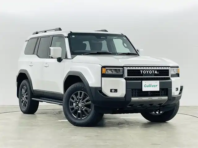 トヨタ ランドクルーザー ２５０ VX 福島県 2024(令6)年 0.1千km プラチナホワイトパールマイカ トヨタセーフティセンス/純正ディスプレイナビ/・フルセグTV/BT/USB/HDMI/・ETC2.0/・アラウンドビューモニター/デジタルインナーミラー/ワイヤレス充電/革張ステアリング/・ステアリングリモコン/・クルーズコントロール/・ステアリングヒーター/レザーシート/・パワーシート/・シートヒーター/JBLサウンド/サンルーフ/BSM/パワーバックドア/LEDヘッドライト/純正18インチAW