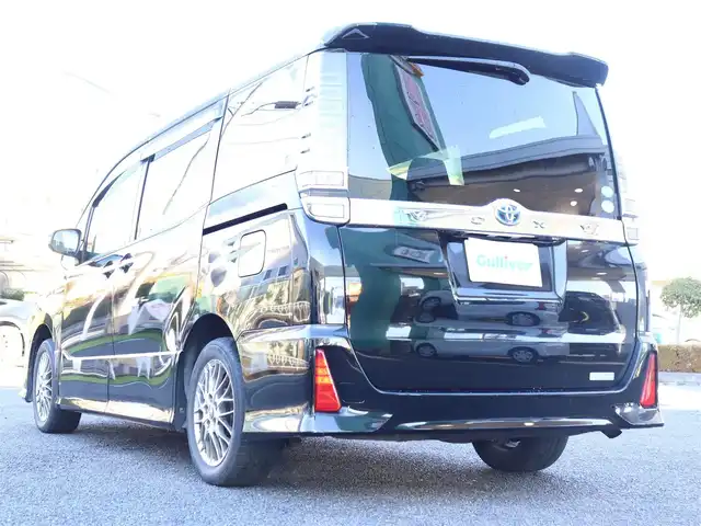 トヨタ ヴォクシー ハイブリッド ZS 煌 神奈川県 2018(平30)年 2.6万km ブラック ワンオーナー/純正メモリナビ/ワンセグテレビ/バックカメラ/両側パワースライドドア/クルーズコントロール/プッシュスタート/ETC/LEDヘッドライト/シートヒーター/保証書/取説/ナビ説/記録（R.1.2.3.4.5.6.7）/スペアスマートキー/社外AW付きスタットレスタイヤ有