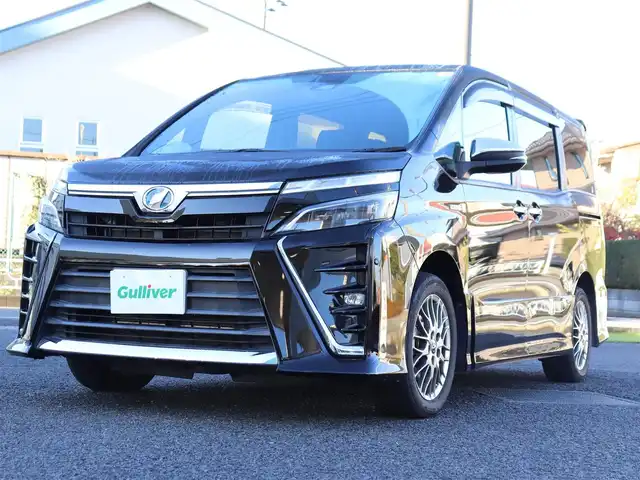 トヨタ ヴォクシー ハイブリッド ZS 煌 神奈川県 2018(平30)年 2.6万km ブラック ワンオーナー/純正メモリナビ/ワンセグテレビ/バックカメラ/両側パワースライドドア/クルーズコントロール/プッシュスタート/ETC/LEDヘッドライト/シートヒーター/保証書/取説/ナビ説/記録（R.1.2.3.4.5.6.7）/スペアスマートキー/社外AW付きスタットレスタイヤ有