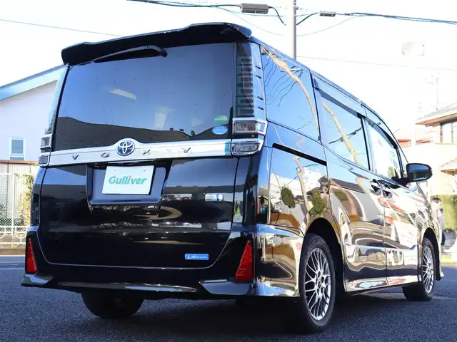 トヨタ ヴォクシー ハイブリッド ZS 煌 神奈川県 2018(平30)年 2.6万km ブラック ワンオーナー/純正メモリナビ/ワンセグテレビ/バックカメラ/両側パワースライドドア/クルーズコントロール/プッシュスタート/ETC/LEDヘッドライト/シートヒーター/保証書/取説/ナビ説/記録（R.1.2.3.4.5.6.7）/スペアスマートキー/社外AW付きスタットレスタイヤ有