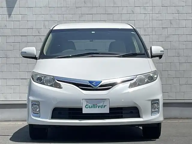 トヨタ エスティマ ハイブリッド X 岩手県 2014(平26)年 4.6万km パール 禁煙車/4WD/AC100V電源/片側パワースライドドア/イージークローザードア/純正ナビ/→Bluetooth/CD/DVD/ワンセグTV/FM/AM/バックカメラ/ステアリングスイッチ（ナビ連動）/クルーズコントロール/前後ドライブレコーダー/〇電装格納ミラー/〇ウィンカーミラー/〇ドアバイザー/〇フロアマット/〇プッシュスタート/オートライト/フォグライト/スペアキー/社外アルミホイール