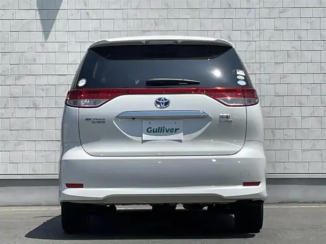 トヨタ エスティマ ハイブリッド X 岩手県 2014(平26)年 4.6万km パール 禁煙車/4WD/AC100V電源/片側パワースライドドア/イージークローザードア/純正ナビ/→Bluetooth/CD/DVD/ワンセグTV/FM/AM/バックカメラ/ステアリングスイッチ（ナビ連動）/クルーズコントロール/前後ドライブレコーダー/〇電装格納ミラー/〇ウィンカーミラー/〇ドアバイザー/〇フロアマット/〇プッシュスタート/オートライト/フォグライト/スペアキー/社外アルミホイール