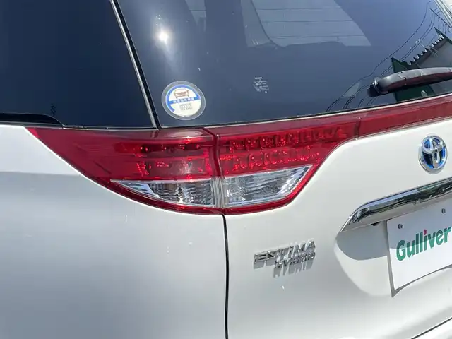 トヨタ エスティマ ハイブリッド X 岩手県 2014(平26)年 4.6万km パール 禁煙車/4WD/AC100V電源/片側パワースライドドア/イージークローザードア/純正ナビ/→Bluetooth/CD/DVD/ワンセグTV/FM/AM/バックカメラ/ステアリングスイッチ（ナビ連動）/クルーズコントロール/前後ドライブレコーダー/〇電装格納ミラー/〇ウィンカーミラー/〇ドアバイザー/〇フロアマット/〇プッシュスタート/オートライト/フォグライト/スペアキー/社外アルミホイール