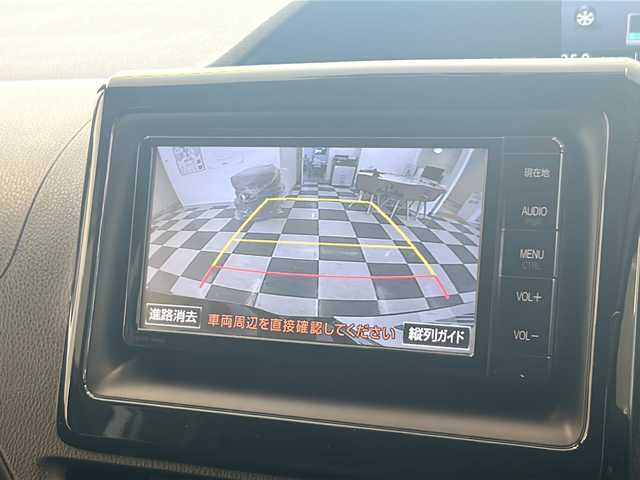 トヨタ エスクァイア ハイブリッド Gi 岐阜県 2015(平27)年 12.7万km スパークリングブラックパールクリスタルシャイン ワンオーナー/置くだけ充電/11インチフリップダウンモニター/D＋N席前席シートヒーター/クルーズコントロール/両側パワースライドドア/3列シート/バックカメラ/フロアマット/ウォークスルー/キセノンヘッドライト/Bluetooth/CD/DVD/純正アルミホイール/フルセグテレビ/TRC/プッシュスタート/盗難防止装置/スペアキー/オートライト