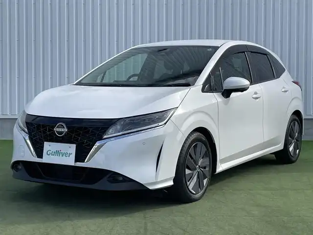 日産 ノート X 香川県 2021(令3)年 7.7万km ピュアホワイトパール 日産コネクティットナビ/【Bluetooth/地デジ対応TV/HDMI/USB】/全方位カメラ/プロパイロット/・レーダークルーズコントロール/・BSM/・BSI（後側方衝突防止支援）/・LDW/・LDP(車線逸脱防止支援)/インテリジェントルームミラー/ワイヤレス充電器/前後クリアランスソナー/LEDヘッドライト/オートライト/オートハイビーム機能/ビルトインETC2.0