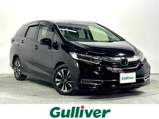 ホンダ シャトル ハイブリッド X ホンダセンシング 大阪府 2019(令1)年 3.9万km クリスタルブラックパール 社外ナビ(フルセグ/DVD再生/Bluetooth) バックカメラ ETC 衝突軽減 レーダークルコン レーンアシスト ハーフレザー シートヒーター パドルシフト スマートキー Pスタート