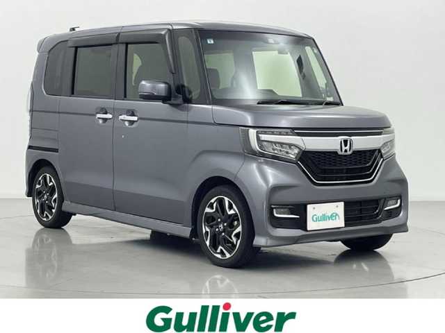 ホンダ Ｎ ＢＯＸ カスタム G L ターボ ホンダセンシング 熊本県 2017(平29)年 5.1万km シャイニンググレーM 禁煙車/純正ナビ（CD・DVD・ワンセグ・BT・USB）/レーダークルーズコントロール/ETC/バックカメラ/社外前後ドライブレコーダー/両側パワースライドドア/前後クリアランスソナー/衝突軽減ブレーキ/レーンキープアシスト/横滑り防止/アイドリングストップ/ハーフレザーシート/純正フロアマット/純正１５インチAW/オートライト/LEDヘッドライト/フォグライト/スマートキー/プッシュスタート/スペアキー1本