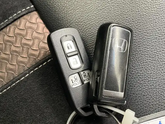 ホンダ Ｎ ＢＯＸ カスタム G L ターボ ホンダセンシング 熊本県 2017(平29)年 5.1万km シャイニンググレーM 禁煙車/純正ナビ（CD・DVD・ワンセグ・BT・USB）/レーダークルーズコントロール/ETC/バックカメラ/社外前後ドライブレコーダー/両側パワースライドドア/前後クリアランスソナー/衝突軽減ブレーキ/レーンキープアシスト/横滑り防止/アイドリングストップ/ハーフレザーシート/純正フロアマット/純正１５インチAW/オートライト/LEDヘッドライト/フォグライト/スマートキー/プッシュスタート/スペアキー1本