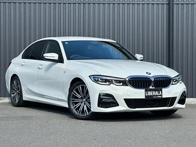 ＢＭＷ ３２０ｄ xDrive Mスポーツ 福島県 2021(令3)年 6万km アルピンホワイトⅢ 純正ナビ(BT/USB)/アダプティブクルーズコントロール/ブラインドスポットモニター/黒レザーシート/シートヒーター/パワーシート/パワーバックドア/バック・360°カメラ/ワイヤレスチャージャー/ミラー一体型ETC/前後ドライブレコーダー/パドルシフト/ステアリングスイッチ/純正18AW/純正フロアマット/LEDヘッドライト/オートホールド/コンフォートアクセス/保証書/取扱説明書