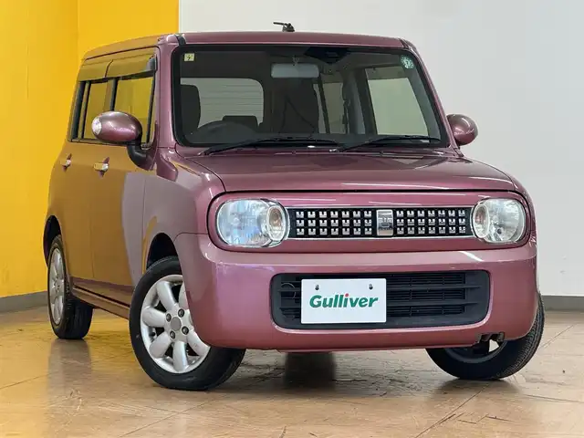 スズキ ラパン 10thアニバーサリーリミテッド 沖縄県 2012(平24)年 8.9万km カシスピンクパールメタリック 純正７インチディーラーナビ/・AM/FM/CD/・ワンセグTV/SD/社外LEDヘッドライト/ドライブレコーダー/運転席シートヒーター/ETC/純正フロアマット/純正ドアバイザー/純正14インチアルミホイール/プッシュスタート/スマートキー/電動格納ミラー