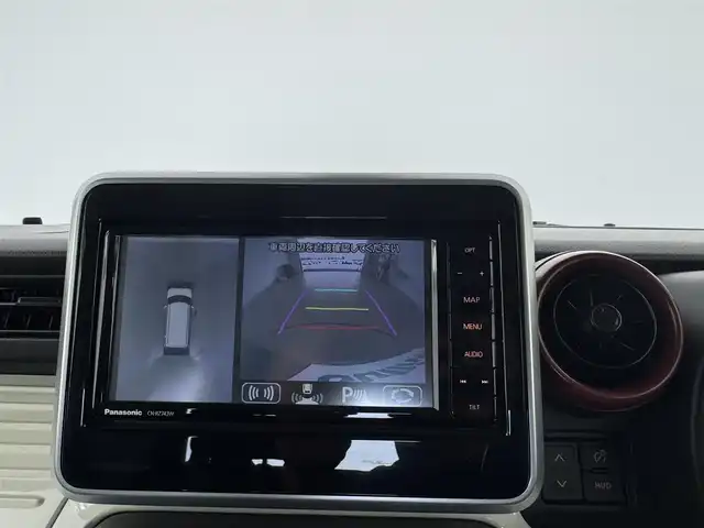 スズキ スペーシア HYBRID X 愛知県 2018(平30)年 1.7万km 緑 純正ナビ/全方位カメラ/シートヒーター/両側パワースライドドア/ヘッドアップディスプレイ/DVD再生可能/USB端子入力/純正フロアマット/レーンアシスト/オートライト/ドアバイザー
