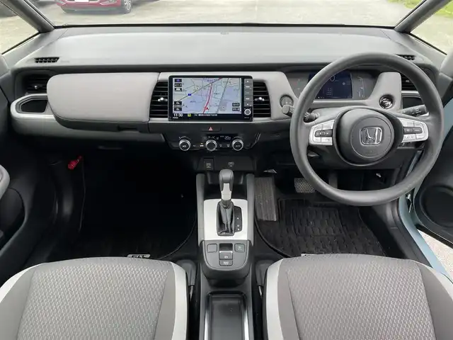 ホンダ フィット e:HEVクロスター 福岡県 2021(令3)年 1.2万km サーフブルー レーンキープアシスト/横滑り防止装置/エアバッグ(W＋サイド)/カーテンエアバッグ/ABS/パーキングアシスト/前後コーナーセンサー/バックカメラ/Gathersナビ(BT/CD/iPod/AUX/AMFM/フルセグ)/クルーズコントロール(追従あり)/オートライト/純正アルミホイール/純正フロアマット/スマートキー/ワンオーナー