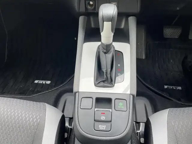 ホンダ フィット e:HEVクロスター 福岡県 2021(令3)年 1.2万km サーフブルー レーンキープアシスト/横滑り防止装置/エアバッグ(W＋サイド)/カーテンエアバッグ/ABS/パーキングアシスト/前後コーナーセンサー/バックカメラ/Gathersナビ(BT/CD/iPod/AUX/AMFM/フルセグ)/クルーズコントロール(追従あり)/オートライト/純正アルミホイール/純正フロアマット/スマートキー/ワンオーナー