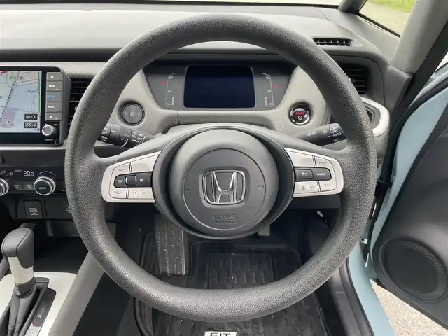 ホンダ フィット e:HEVクロスター 福岡県 2021(令3)年 1.2万km サーフブルー レーンキープアシスト/横滑り防止装置/エアバッグ(W＋サイド)/カーテンエアバッグ/ABS/パーキングアシスト/前後コーナーセンサー/バックカメラ/Gathersナビ(BT/CD/iPod/AUX/AMFM/フルセグ)/クルーズコントロール(追従あり)/オートライト/純正アルミホイール/純正フロアマット/スマートキー/ワンオーナー