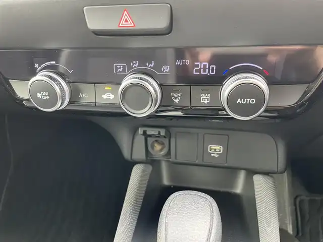 ホンダ フィット e:HEVクロスター 福岡県 2021(令3)年 1.2万km サーフブルー レーンキープアシスト/横滑り防止装置/エアバッグ(W＋サイド)/カーテンエアバッグ/ABS/パーキングアシスト/前後コーナーセンサー/バックカメラ/Gathersナビ(BT/CD/iPod/AUX/AMFM/フルセグ)/クルーズコントロール(追従あり)/オートライト/純正アルミホイール/純正フロアマット/スマートキー/ワンオーナー