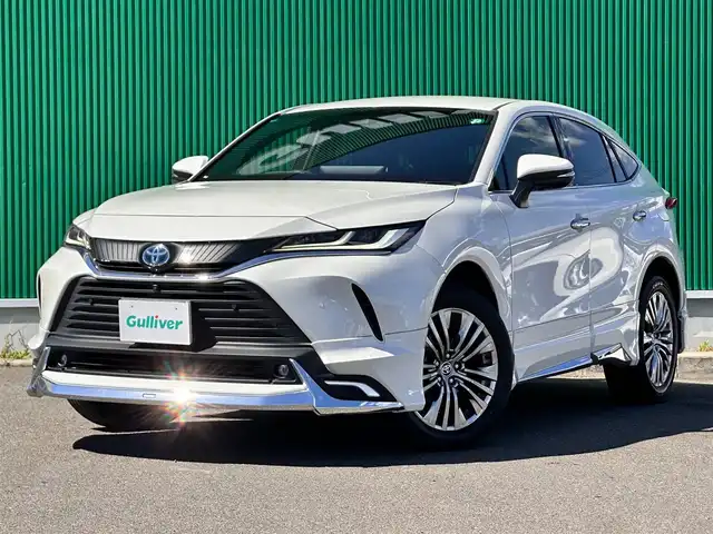 トヨタ ハリアー ハイブリッド Z 宮城県 2021(令3)年 5.5万km ホワイトパールクリスタルシャイン モデリスタエアロ（F/S/R）/セーフティセンス/・プリクラッシュセーフティ/・レーントレーシングアシスト/・レーダークルーズコントロール/・アダプティブハイビームシステム/・ロードサインアシスト/ブラインドスポットモニター/パーキングサポートブレーキ（前後方静止物/後方接近車両）/デジタルインナーミラー/カラーヘッドアップディスプレイ/TコネクトSDナビゲーションシステム/・12.3インチディスプレイ/・SDナビ/・Bluetooth/・AppleCarPlay/AndroidAuto/・フルセグTV/パノラミックビューモニター/ビルトインETC2.0/ハンズフリーパワーバックドア/ハーフレザーシート/パワーシート/革巻きステアリング/ステアリングスイッチ/電動パーキングブレーキ/ブレーキホールド/LEDヘッドランプ/フォグランプ/オートライト/スマートキー＆プッシュスタート/スペアキー/電動格納ミラー/純正19インチAW/純正フロアマット/W/サイド/カーテンエアバッグ