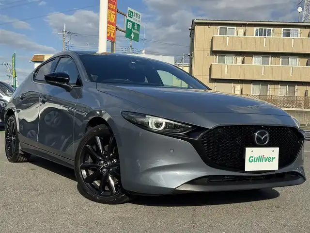 マツダ マツダ３ファストバック 20S ブラックトーンED 千葉県 2022(令4)年 2.2万km ポリメタルグレーM ワンオーナー/i-ACTIVSENSE/・衝突被害軽減ブレーキ/・AT誤発進抑制機能/・レーンキープアシスト/ブラインドスポットモニタリング/前後コーナーセンサー/純正ナビ/CD/DVD/BT/フルセグTV/バック+全方位カメラ/ETC/前後ドラレコ/純正フロアマット/純正18インチアルミホイール/パドルシフト/LEDヘッドライト/オートライト/オートハイビーム/W+サイドエアバッグ/スマートキー/スペアキー1本/取扱説明書＆保証書