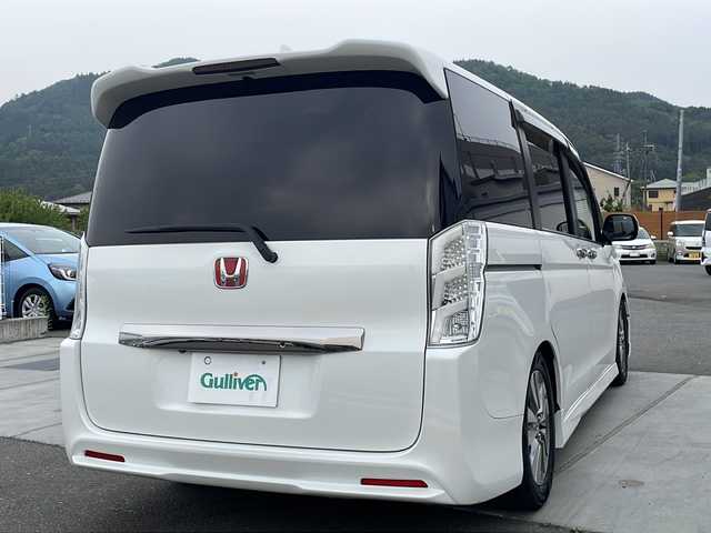 ホンダ ステップワゴン スパーダ Z クールスピリット 山梨県 2014(平26)年 9.4万km ホワイトオーキッドパール 純正ナビ/ヘッドレストモニター/ETC/LEDヘッドライト/ワンセグテレビ/バックカメラ/クルーズコントロール/純正16インチアルミホイール/オートライト/オートエアコン/両側電動スライドドア/イージークローザー/Bluetooth再生
