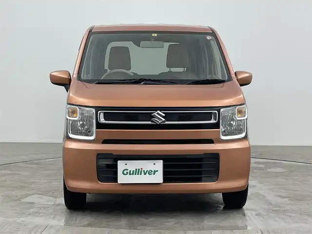 スズキ ワゴンＲ FA 大分県 2018(平30)年 9.1万km リフレクティブオレンジM 社外オーディオ/・CD/AM/FM/AUX/純正フロアマット/ドアバイザー/電動格納ミラー/横滑り防止装置/マニュアルレベライザー/リモコンキー