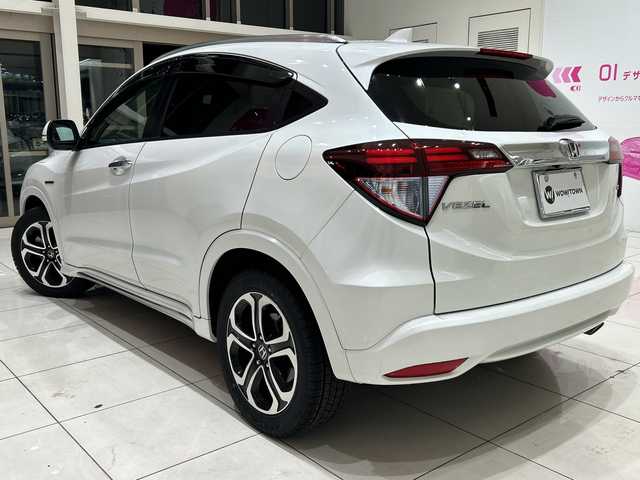 ホンダ ヴェゼル ハイブリッド Z ホンダセンシング 埼玉県 2017(平29)年 4.6万km ホワイトオーキッドパール ホンダセンシング/純正ナビ/　　CD/DVDBT/フルセグTV/バックカメラ/アダプティブクルーズコントロール/LEDオートライト/ハーフレザー/シートヒーター/純正17インチAW/パドルシフト/ステアリングスイッチ/プッシュスタート/ETC/禁煙車