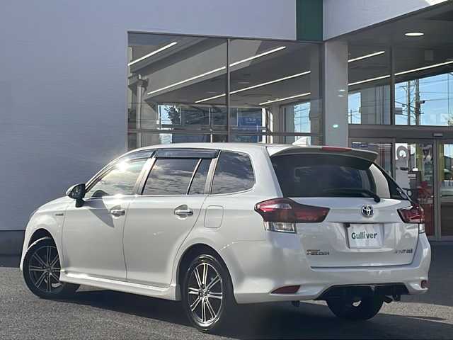 トヨタ カローラ フィールダー ハイブリッドG ダブルバイビー 愛知県 2017(平29)年 5.7万km ホワイトパールクリスタルシャイン /ワンオーナー//禁煙車//ストラーダナビ（CN-RE03WD）//AM・FM・Bluetooth・DVD・CD//フルセグTV//バックカメラ//プッシュスタート//ETC//ＬＥＤヘッドライト・オートライト//前方ドライブレコーダー（DRY-STE3000)//純正16インチホイール//スペアキー（1本）//電動格納ミラー//横滑り防止//車線逸脱警報//運転モード（EC・EV)//ブレーキアシスト//衝突安全ボディー//EBD（電力制御制動力配分システム）//VSC（ビークルスタビリティコントロール）//TRC（トラクションコントロールシステム）//UVカットガラス//プライバシーガラス//アイドリングストップ//保証証//取扱説明書//記録簿