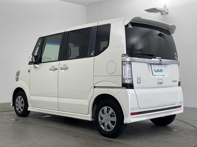 ホンダ Ｎ ＢＯＸ カスタム G 兵庫県 2012(平24)年 3.9万km プレミアムホワイトパール ・運転席用i-SRSエアバッグシステム〈連続容量変化タイプ〉＆助手席用SRSエアバッグシステム/・VSA（ABS＋TCS＋横すべり抑制）/・EBD（電子制御制動力配分システム）付ABS/・プロジェクタータイプ ディスチャージヘッドライト〈HID〉/・ヒルスタートアシスト機能/・アイドリングストップシステム/・ECONモード/・Hondaスマートキーシステム（アンサーバック/ウエルカムランプ機能付） /・電動格納式リモコンカラードドアミラー/・親水/ヒーテッドドアミラー＋フロントドア撥水ガラス/・UVカット機能付ガラス（フロントウインドウ/フロントコーナー/フロントドア）/・高熱線吸収/UVカット機能付プライバシーガラス（リアドア/リアクォーター/テールゲート）/・クリアアウターレンズ・リアコンビネーションランプ（LEDストップランプ＆LEDテールランプ）/・フォグライト/・フルホイールキャップ