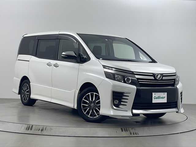 トヨタ ヴォクシー ZS 煌Ⅱ 埼玉県 2017(平29)年 5.4万km ホワイトパールクリスタルシャイン 純正10インチナビ　NSZN-Z66T/(Bluetooth/CD/DVD/AM/FM)/地デジフルセグ/バックカメラ/ETC/オートマチックハイビーム/車線逸脱警報/衝突軽減ブレーキ/先行車発進お知らせ機能/アイドリングストップ/ECOモード/ロールサンシェード/プッシュスタート/ステアリングリモコン/両側パワースライドドア/フロントフォグランプ/ウィンカーミラー/電動格納ミラー/純正フロアマット/純正ドアバイザー/純正16インチアルミホイール