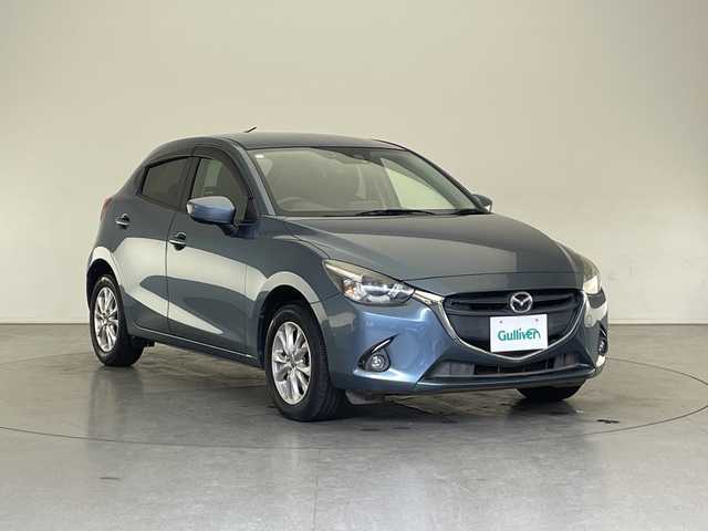 マツダ デミオ 13S 長野県 2015(平27)年 2.4万km ブルーリフレックスマイカ 4WD/ワンオーナー/純正SDナビ&フルセグTV&CD&DVD&USB&BT/衝突軽減ブレーキ/アイドリングストップ/ステアリングスイッチ/バックカメラ/ETC/LEDヘッドライト/オートライト/電動格納ミラー/純正15インチAW付サマータイヤ装着/社外AW付スタッドレスタイヤ積込/純正フロアマット/プッシュスタート/スマートキー/スペアキー1本/取扱説明書/新車保証書