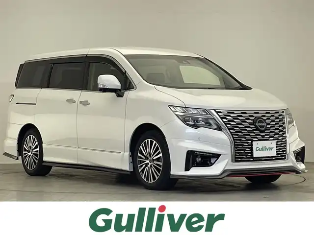 日産 エルグランド 250ハイウェイスターS 滋賀県 2023(令5)年 1.3万km ピュアホワイトパール 禁煙車/純正ナビ（FM/AM/フルセグ/CD/DVD/ Blu-ray/Bluetooth）/全方位カメラ/前後コーナーセンサー/両側パワースライドドア/電動リアゲート/フリップダウンモニター/nismoエアロ（フル）/ハーフレザーシート/追従型クルコン/レーンキープアシスト/LEDヘッドライト/ETC