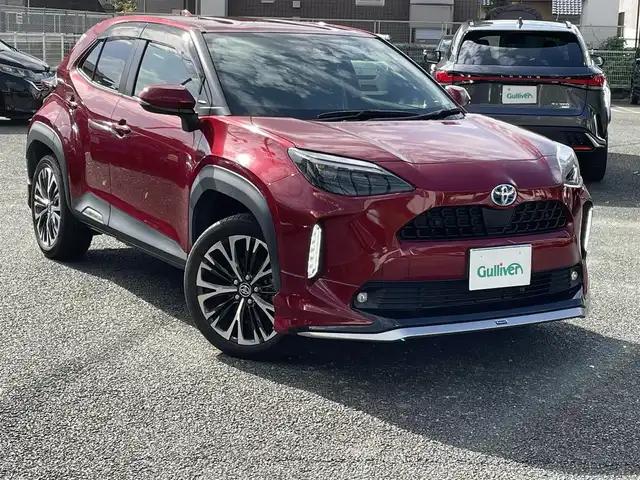 トヨタ ヤリスクロス ハイブリッド Z 熊本県 2021(令3)年 2.5万km センシュアルレッドマイカ ワンオーナー/純正ナビ/バックカメラ/ビルトインETC/前後ドライブレコーダー/純正18インチAW/レーダークルーズ/ハーフレザーシート/右前席パワーシート/前席シートヒーター/LEDヘッドライト/オートライト/フォグライト/前後コーナーセンサー/横滑り防止装置/ウィンカーミラー/純正フロアマット/純正ドアバイザー/新車保証書/取扱説明書/スマートスペアキー×1本