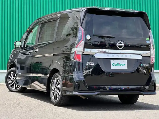 日産 セレナ e－パワー ハイウェイスター V 宮城県 2021(令3)年 1.4万km ダイヤモンドブラック セーフティパックA/・SRSエアバッグ（サイド/カーテン）/・インテリジェントアラウンドビューモニター/・インテリジェントルームミラー/・ふらつき警報/・ヒーター付ドアミラー/16インチアルミホイール/オートデュアルエアコン＋リヤヒーターダクト  /＝＝＝/プロパイロット/インテリジェントエマージェンシーブレーキ/踏み間違い衝突防止アシスト/車線逸脱防止支援システム/後側方衝突防止支援システム/標識検知機能/前方衝突予測警報/車線逸脱警報/後側方車両検知警報/後退時車両検知警報/コーナーセンサー/純正10インチナビ/・CD/DVD/・Blu-ray/・Bluetooth/・フルセグTV/ビルトインETC/ドライブレコーダー/両側パワースライドドア/革巻きステアリング/ステアリングスイッチ/LEDヘッドライト/LEDフォグランプ/オートライト/電子パーキング/オートホールド/純正フロアマット/純正ドアバイザー/W/サイド/カーテンエアバッグ