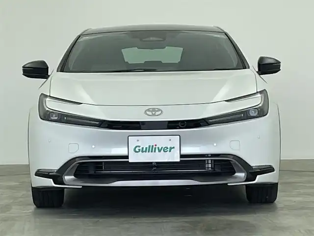 トヨタ プリウス Z 群馬県 2024(令6)年 1.1万km プラチナホワイトパールマイカ １２．３型ＤＡ（フルセグ/BT/Miracast/USB）/ガラスルーフ/全方位カメラ/衝突軽減/パーキングアシスト/ＢＳＭ/レーダークルーズ/ＰＷバックドア/メモリー付ＰＷシート/エアーシート/シートヒーター/１００Ｖ電源/ＥＴＣ２．０/前後ドラレコ/デジタルインナーミラー/前後コーナーセンサー/LEDヘッド/純正アルミ/禁煙車