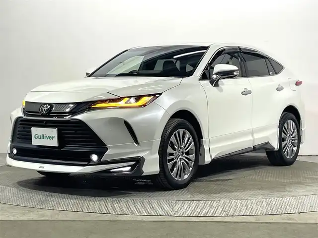 トヨタ ハリアー Z 大阪府 2020(令2)年 1.6万km ホワイトパールクリスタルシャイン モデリスタエアロ 純正12.3incナビTV 360カメラ デジタルインナーミラー ハーフレザー パワーシート 電動リアゲート ヘッドアップディスプレイ レーダーC 衝突軽減ブレーキ レーンアシスト ブラインドSM JBLサウンド