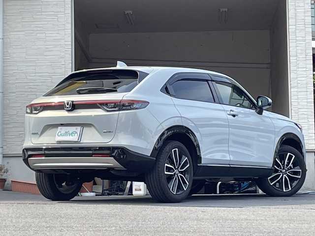 ホンダ ヴェゼル ハイブリッド e:HEV Z 大分県 2023(令5)年 2.5万km プレミアムサンライトホワイトパール ワンオーナー /ハーフレザーシート /全方位カメラ/おくだけ充電/デジタルインナーミラー/パワーバックドア/純正ナビ/フルセグTV/Bluetooth/純正フロアマット/純正18インチアルミホイール/純正ETC/純正ドラレコ/純正LEDヘッドライト/オートライト/衝突被害軽減ブレーキ/横滑り防止装置/レーンキープアシスト/コーナーセンサー