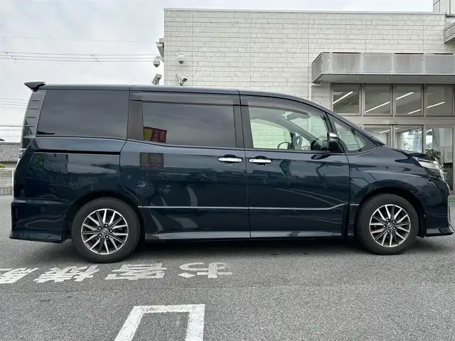 トヨタ ヴォクシー ZS 煌Ⅱ 奈良県 2016(平28)年 12.2万km ブラッキッシュアゲハガラスフレーク ワンオーナー/純正ナビ（NSZN-266T）/純正フリップダウン/純正16インチナビ/バックカメラ/フルセグTV/ブルートゥース/サンシェード/両側パワースライドドア/衝突軽減ブレーキ/スタットレス付き/電格ミラー/オートライト/フォグライト/保証書/取扱説明書