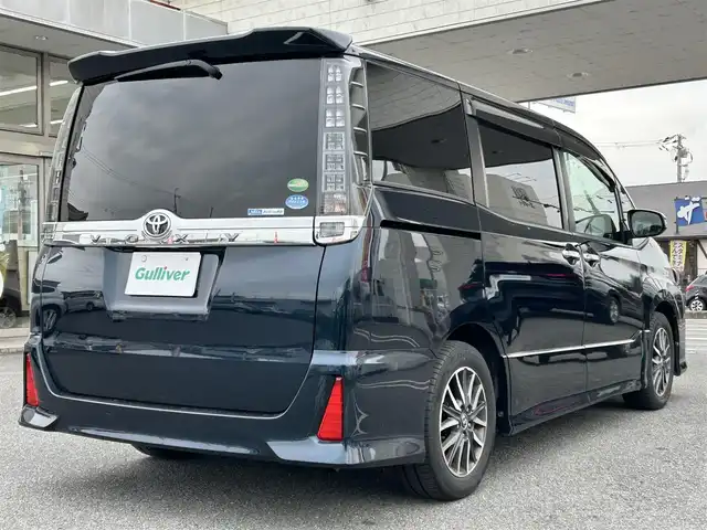 トヨタ ヴォクシー ZS 煌Ⅱ 奈良県 2016(平28)年 12.2万km ブラッキッシュアゲハガラスフレーク ワンオーナー/純正ナビ（NSZN-266T）/純正フリップダウン/純正16インチナビ/バックカメラ/フルセグTV/ブルートゥース/サンシェード/両側パワースライドドア/衝突軽減ブレーキ/スタットレス付き/電格ミラー/オートライト/フォグライト/保証書/取扱説明書