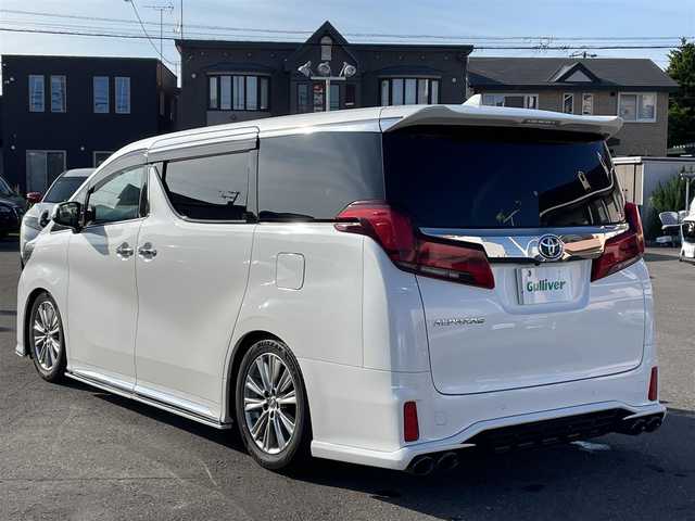 トヨタ アルファード S タイプゴールドⅡ 道央・札幌 2021(令3)年 2.6万km ホワイトパールクリスタルシャイン 登録時走行距離　25878km/　4　W　D　/SWIFT車高調/社外フルエアロ/Toyota Safety Sense/・プリクラッシュセーフティ/・レーンディバーチャーアラート/・オートマチックハイビーム/・クリアランスソナー/・レーダークルーズコントロール/純正ディスプレイオーディオ/フルセグTV/DVD再生あり/バックカメラ/両側パワースライドドア/パワーバックドア/デジタルインナーミラー/純正エンジンスターター/三眼LEDヘッドライト/シーケンシャルウィンカー/社外ウィンカーミラー/室内灯LED/純正サスペンション積込/Admiration4本出しマフラー/革巻きステアリング/盗難防止装置/プッシュスタート/スマートキー/スペアキー×１/純正フロアマット/純正ドアバイザー/取説/保証書