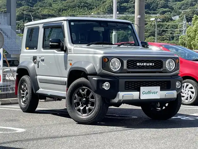 スズキ ジムニー シエラ JC 長崎県 2020(令2)年 1.9万km シルキーシルバーメタリック ワンオーナー/社外SDナビ/・AM/FM/BT/フルセグTV/クルーズコントロール/ステアリングスイッチ/ETC/前席シートヒーター/革調シートカバー/前方ドライブレコーダー/ライトウォッシャー/ラバー調フロアマット/純正オプションフロントグリル/純正マッドガード/背面タイヤ/背面タイヤカバー/HONESTクリア給油口カバー/保証書/取扱説明書/スペアキー/純正グリル積載/純正給油口カバー積載
