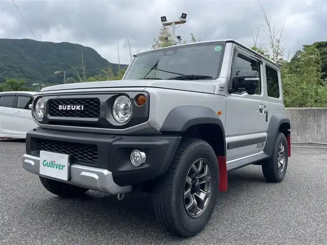 スズキ ジムニー シエラ JC 長崎県 2020(令2)年 1.9万km シルキーシルバーメタリック ワンオーナー/社外SDナビ/・AM/FM/BT/フルセグTV/クルーズコントロール/ステアリングスイッチ/ETC/前席シートヒーター/革調シートカバー/前方ドライブレコーダー/ライトウォッシャー/ラバー調フロアマット/純正オプションフロントグリル/純正マッドガード/背面タイヤ/背面タイヤカバー/HONESTクリア給油口カバー/保証書/取扱説明書/スペアキー/純正グリル積載/純正給油口カバー積載
