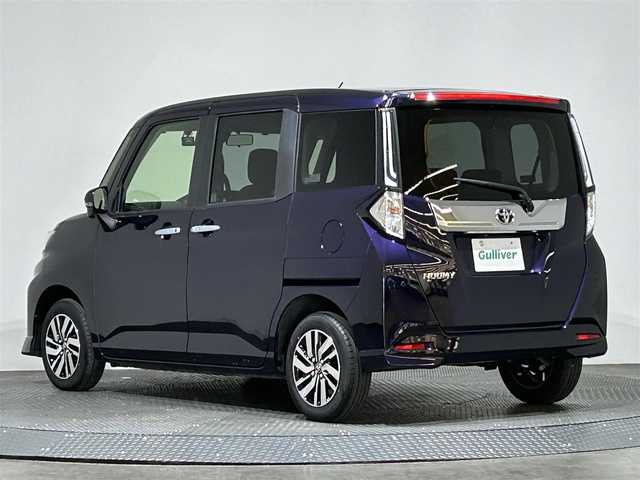 トヨタ ルーミー カスタムG 愛媛県 2023(令5)年 0.2万km クールバイオレットクリスタルシャイン ・９型ディスプレイオーディオ/（ＢＴ・フルセグＴＶ・ＦＭＡＭ・ＡｐｐｌｅＣａｒｐｌａｙ・ＡｎｄｒｏｉｄＡｕｔｏ・ＵＳＢ接続）/・全方位カメラ　/・前後ドライブレコーダー　/・レーダークルーズコントロール　/・両側パワースライドドア/・衝突軽減ブレーキ/・前後コーナーセンサー/・リヤドアサンシェード/・スペアキー